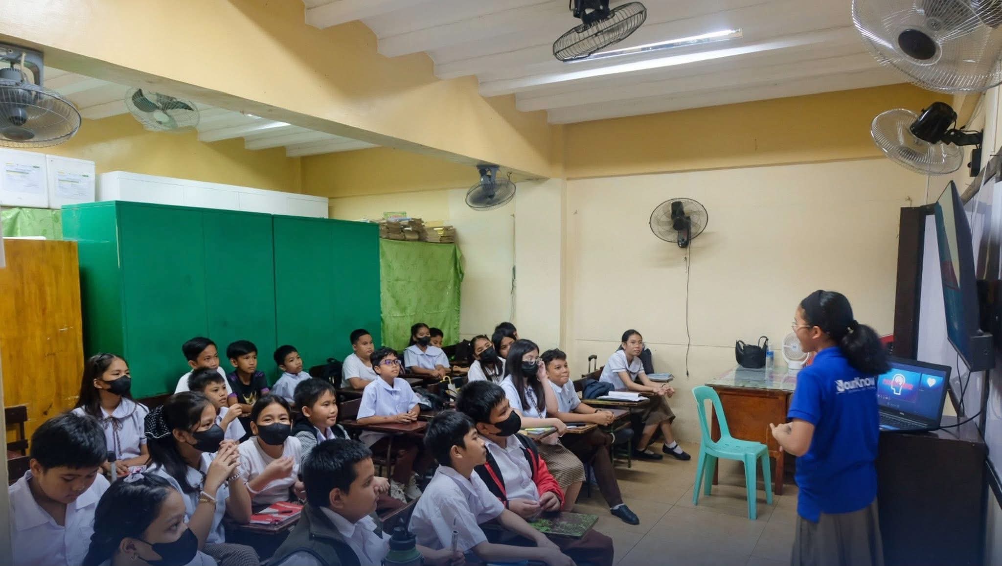 A JourKnows facilitator leading a classroom of student journalists during a training session.